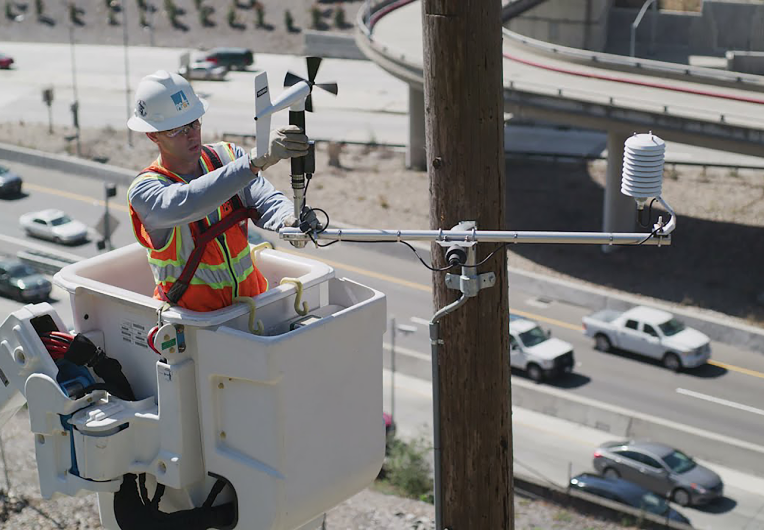 Linemen performing a systems upgrade