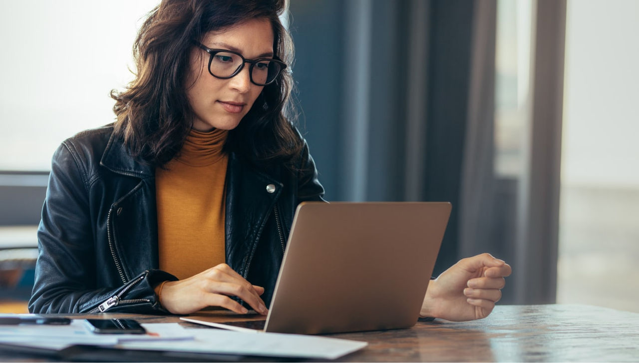 Person looking at a laptop computer screen